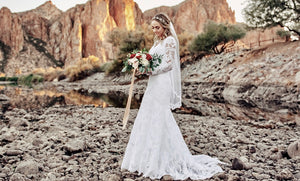 A Large In-Store Inventory of modest lace wedding dresses at A Closet Full of Dresses