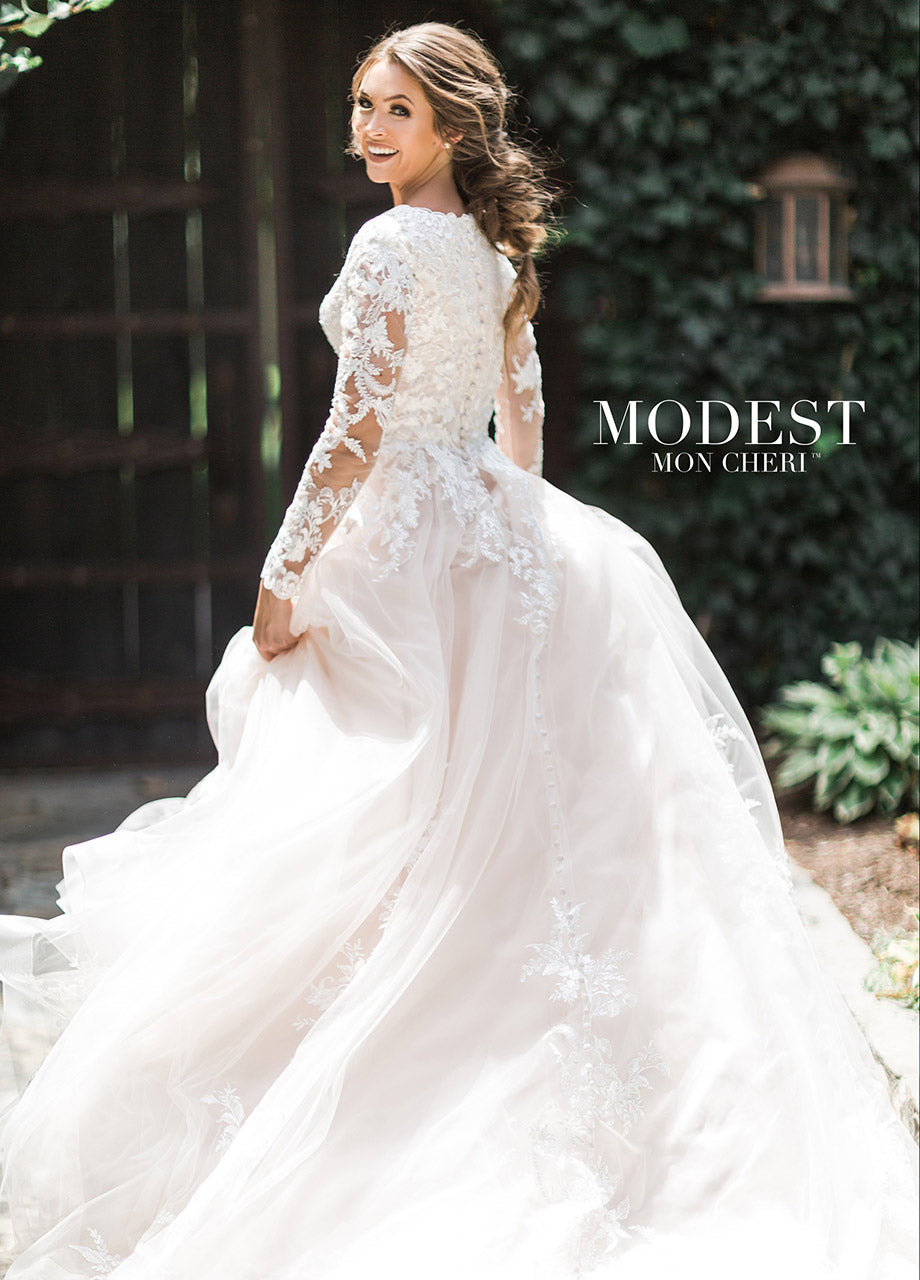 Mon Cheri TR11972 Modest Wedding Dress outside from A Closet Full of Dresses