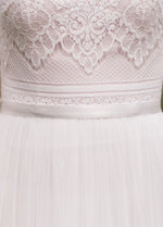 Mon Cheri TR11976 Modest Wedding Dress fabric from A Closet Full of Dresses