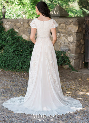 Mon Cheri TR11985 Modest Wedding Dress Back from A Closet Full of Dresses
