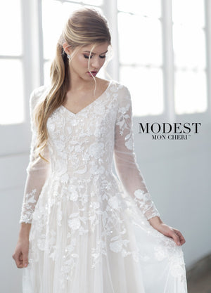 Mon Cheri TR21858 Modest Wedding Dress Close from A Closet Full of Dresses