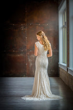Mon Cheri TR21910 Modest Wedding Dress Back from A Closet Full of Dresses
