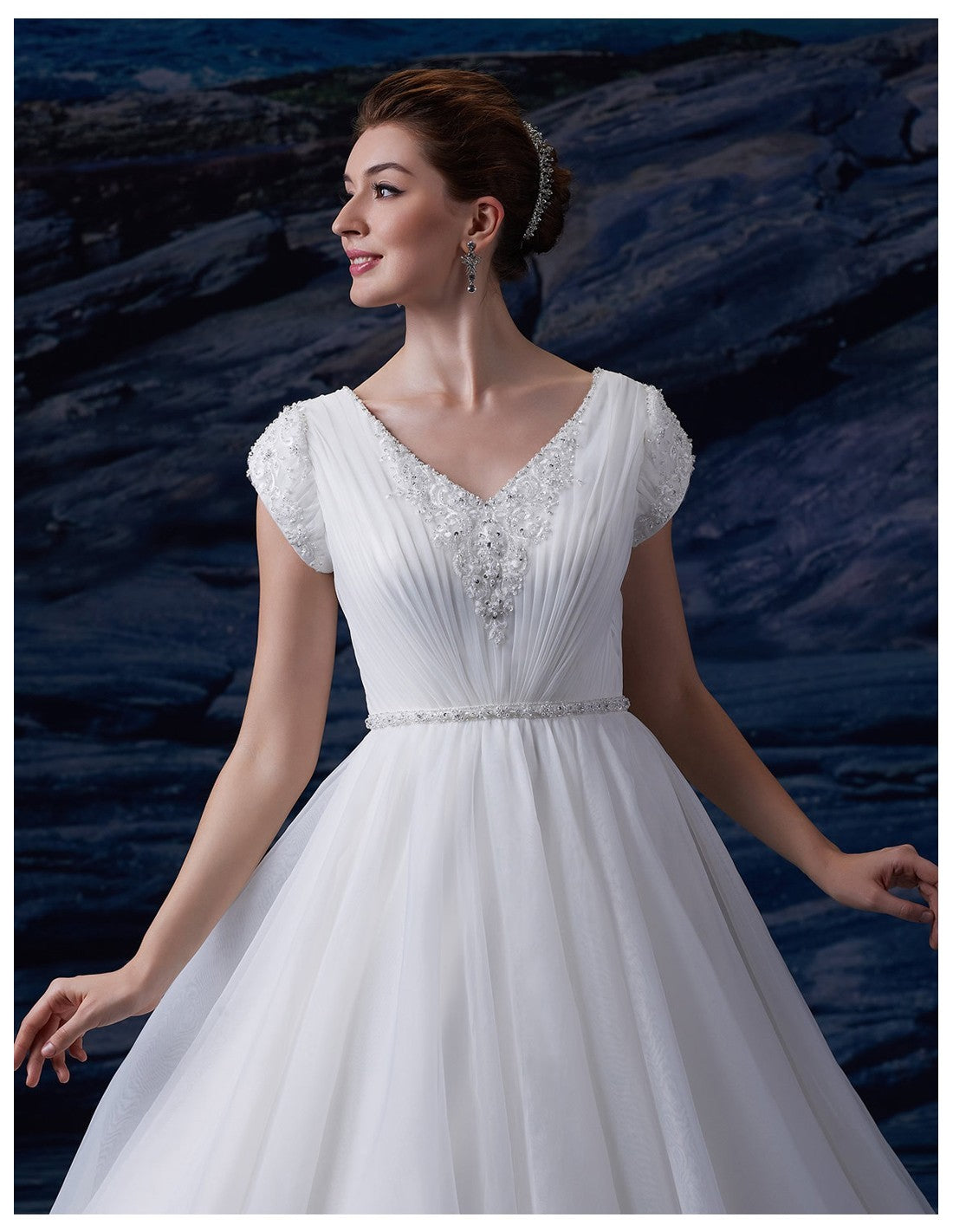 Venus Bridal TB7677 White Modest Wedding Dress closeup from A Closet Full of Dresses